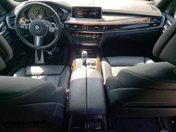 2017 BMW X5 xDrive35i with VIN 5UXKR0C37H0X80867, listed as a Copart auction lot 58697515 with 54,191 mi miles and Salvage title. Bid and sale history available at DreamBid. Image 8.