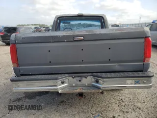 1992 Ford F-150 with VIN 1FTDF15Y4NLA94328, listed as a Copart auction lot 51690965 with 191,656 mi miles and Salvage Title. Bid and sale history available at carsss.com. Image 6.