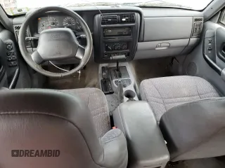 1998 Jeep Cherokee Sport with VIN 1J4FJ68S9WL241184, listed as a Copart auction lot 87360684 with 257,954 mi miles and Clean Title. Bid and sale history available at carsss.com. Image 8.