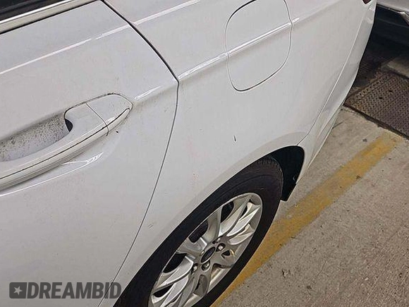2015 Ford Fusion S with VIN 1FA6P0G7XF5127770, listed as a IAAI auction lot 42845978 with 150,942 mi miles and . Bid and sale history available at DreamBid. Image 22.
