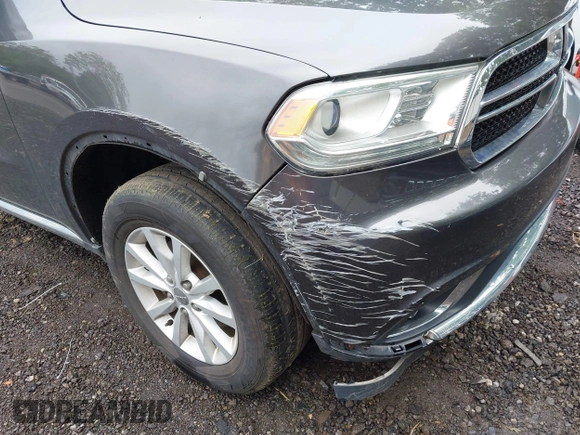2015 Dodge Durango SXT with VIN 1C4RDJAG6FC177561, listed as a IAAI auction lot 42314437 with 104,898 mi miles and . Bid and sale history available at DreamBid. Image 6.