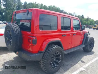 2021 Jeep Wrangler Unlimited Sahara z VIN 1C4HJXEGXMW631033, wystawiony jako IAAI lot #42550070 z przebiegiem 54 429 mil mil oraz . Historia ofert i sprzedaży dostępna na DreamBid. Obrazek 4.
