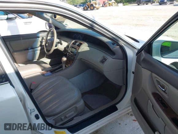 2001 Toyota Avalon XL z VIN 4T1BF28B01U142721, wystawiony jako IAAI lot #42340748 z przebiegiem 204 644 mil mil oraz . Historia ofert i sprzedaży dostępna na DreamBid. Obrazek 5.