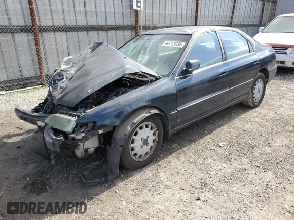 1997 Honda Accord EX with VIN 1HGCD5668VA262569, listed as a Copart auction lot 44713835 with 261,346 mi miles and Salvage Title. Bid and sale history available at DreamBid. Image 1.