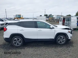 2020 GMC Terrain SLT z VIN 3GKALVEVXLL143417, wystawiony jako IAAI lot #41714662 z przebiegiem 97 634 mil mil oraz . Historia ofert i sprzedaży dostępna na DreamBid. Obrazek 13.