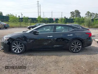 2016 Nissan Maxima Platinum z VIN 1N4AA6AP8GC901079, wystawiony jako IAAI lot #42423396 z przebiegiem 100 750 mil mil oraz . Historia ofert i sprzedaży dostępna na DreamBid. Obrazek 14.
