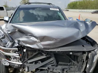 2020 Chevrolet Tahoe Premier with VIN 1GNSKCKC7LR125399, listed as a Copart auction lot 54702635 with 134,684 mi miles and Salvage title. Bid and sale history available at DreamBid. Image 11.