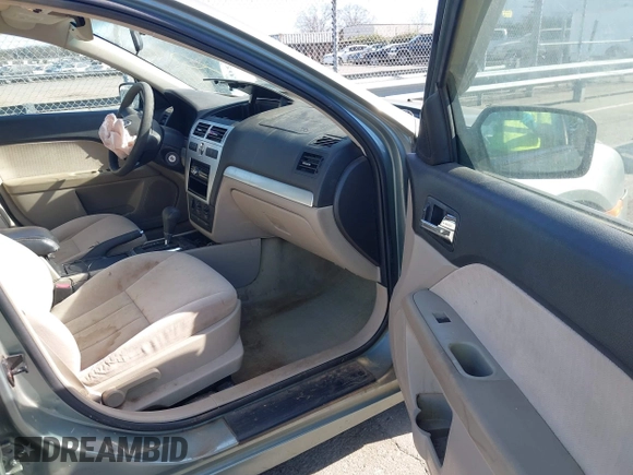 2006 Mercury Milan with VIN 3MEFM07Z56R638920, listed as a IAAI auction lot 41682035 with 212,844 mi miles and . Bid and sale history available at DreamBid. Image 5.