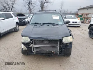 2004 Ford Escape Limited with VIN 1FMCU94124KA36321, listed as a IAAI auction lot 41565490 with 203,933 mi miles. Bid and sale history available at carsss.com. Image 12.