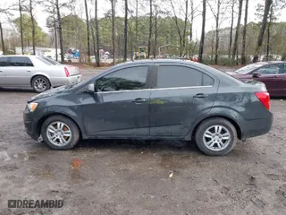 2014 Chevrolet Sonic LT with VIN 1G1JC5SH8E4234634, listed as a IAAI auction lot 41464054 with 117,113 mi miles. Bid and sale history available at carsss.com. Image 15.