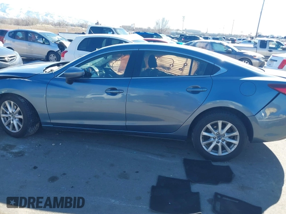 2016 Mazda 6 i Sport with VIN JM1GJ1U57G1451597, listed as a IAAI auction lot 41658184 with 142,504 mi miles and . Bid and sale history available at DreamBid. Image 14.