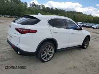 2018 Alfa Romeo Stelvio z VIN ZASFAKAN3J7B89286, wystawiony jako Copart lot #55717365 z przebiegiem 81 672 mil mil oraz Szkoda całkowita • Salvage title. Historia ofert i sprzedaży dostępna na DreamBid. Obrazek 3.