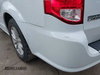 2015 Dodge Grand Caravan SXT with VIN 2C4RDGCG2FR548433, listed as a IAAI auction lot 42121256 with 161,459 mi miles and . Bid and sale history available at DreamBid. Image 13.