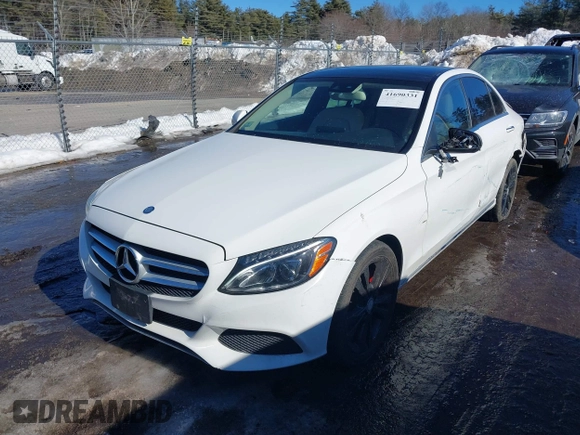 2016 Mercedes-Benz C C 300 Luxury with VIN 55SWF4KB2GU160423, listed as a IAAI auction lot 41690331 with 94,494 mi miles. Bid and sale history available at carsss.com. Image 2.