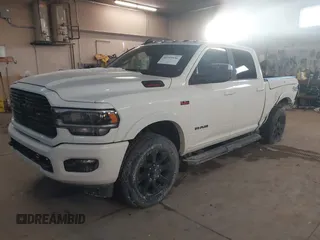 2022 Ram 2500 Laramie with VIN 3C6UR5FJ7NG253380, listed as a IAAI auction lot 41319536 with 33,945 mi miles. Bid and sale history available at carsss.com. Image 2.