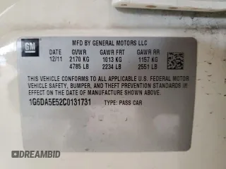 2012 Cadillac CTS with VIN 1G6DA5E52C0131731, listed as a Copart auction lot 59223235 with 104,521 mi miles and Salvage title. Bid and sale history available at DreamBid. Image 12.