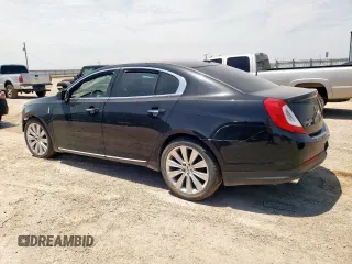 2013 Lincoln MKS EcoBoost with VIN 1LNHL9FT5DG606208, listed as a Copart auction lot 59224735 with 156,202 mi miles and Salvage title. Bid and sale history available at DreamBid. Image 2.