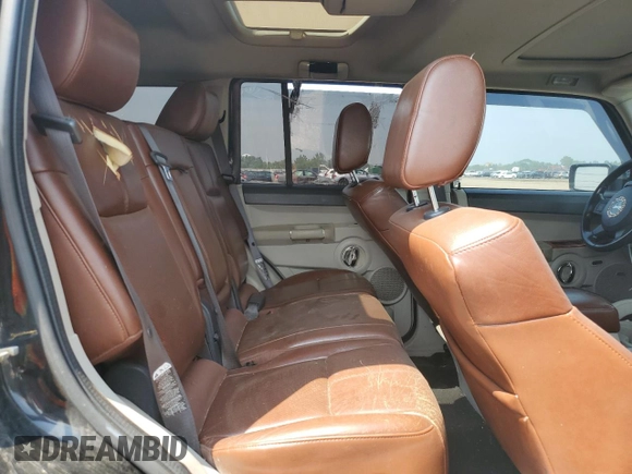 2007 Jeep Commander Limited z VIN 1J8HG58P27C520330, wystawiony jako Copart lot #54595745 z przebiegiem 168 908 mil mil oraz Szkoda całkowita • Salvage title. Historia ofert i sprzedaży dostępna na DreamBid. Obrazek 11.
