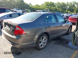 2012 Ford Fusion SE with VIN 3FAHP0HA9CR171027, listed as a IAAI auction lot 42394989 with 249,745 mi miles and . Bid and sale history available at DreamBid. Image 4.