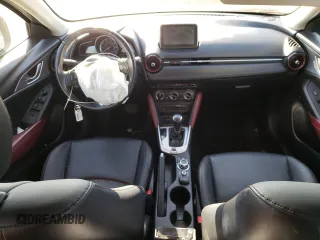 2016 Mazda CX-3 Touring z VIN JM1DKFC77G0136787, wystawiony jako Copart lot #50697845 z przebiegiem 96 277 mil mil oraz Szkoda całkowita • Salvage title. Historia ofert i sprzedaży dostępna na DreamBid. Obrazek 8.