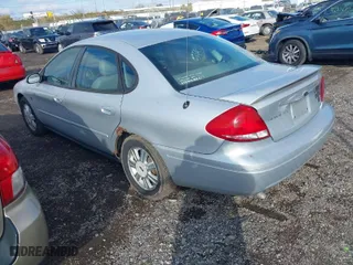 2004 Ford Taurus SEL with VIN 1FAFP56S04A205058, listed as a IAAI auction lot 40796889 with 187,562 mi miles. Bid and sale history available at carsss.com. Image 3.