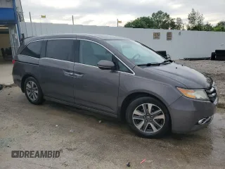 2015 Honda Odyssey Touring Elite with VIN 5FNRL5H95FB117985, listed as a Copart auction lot 57178695 with 199,757 mi miles and Non repairable. Bid and sale history available at DreamBid. Image 4.