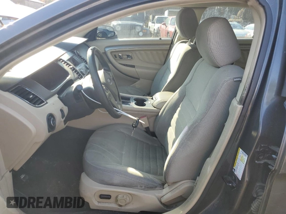 2015 Ford Taurus SE with VIN 1FAHP2D86FG184747, listed as a Copart auction lot 77659254 with 140,404 mi miles and Clean Title. Bid and sale history available at carsss.com. Image 7.