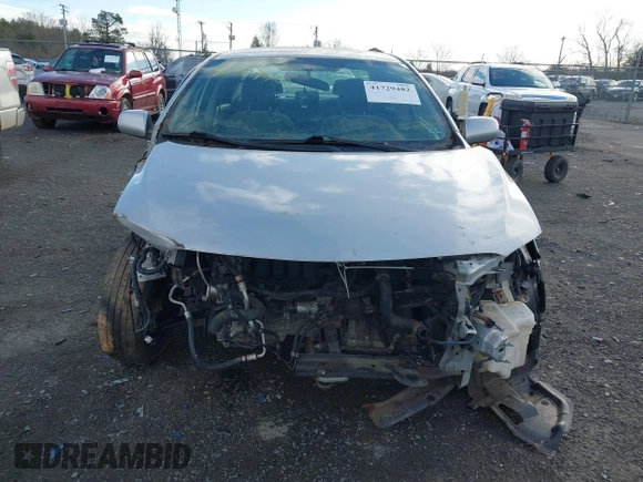 2009 Toyota Corolla with VIN 2T1BU40E09C150287, listed as a IAAI auction lot 41729482 with 103,712 mi miles. Bid and sale history available at carsss.com. Image 6.