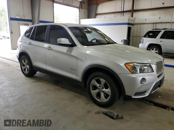 2012 BMW X3 28i with VIN 5UXWX5C56CL721970, listed as a Copart auction lot 51210875 with 125,661 mi miles and Salvage Title. Bid and sale history available at DreamBid. Image 4.