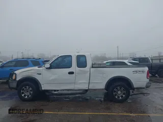1997 Ford F-150 XL with VIN 1FTDX1863VNB01474, listed as a IAAI auction lot 41446672 with 223,296 mi miles. Bid and sale history available at carsss.com. Image 14.