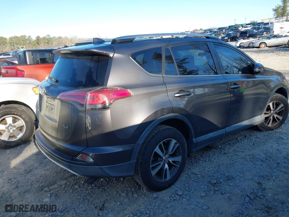2016 Toyota RAV4 XLE with VIN 2T3WFREV0GW266691, listed as a IAAI auction lot 41804023 with 77,000 mi miles. Bid and sale history available at carsss.com. Image 4.