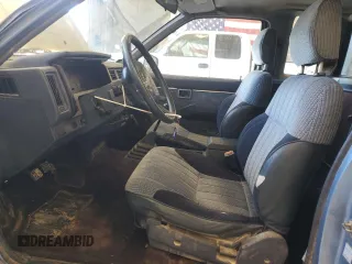 1989 Nissan Hardbody z VIN 1N6HD16S3KC401756, wystawiony jako Copart lot #46811635 z przebiegiem 78 698 mil mil oraz Szkody całkowita. Historia ofert i sprzedaży dostępna na DreamBid. Obrazek 7.