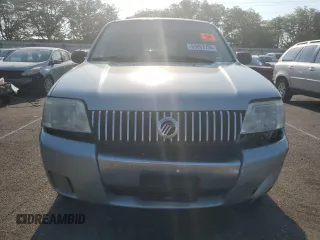 2005 Mercury Mariner Luxury z VIN 4M2CU57125DJ16694, wystawiony jako Copart lot #69063704 z przebiegiem 222 793 mil mil oraz Szkody całkowita. Historia ofert i sprzedaży dostępna na DreamBid. Obrazek 5.