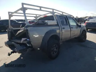 2002 Nissan Frontier SE with VIN 1N6ED27T52C383700, listed as a Copart auction lot 86204074 with 216,908 mi miles and Salvage title. Bid and sale history available at DreamBid. Image 3.