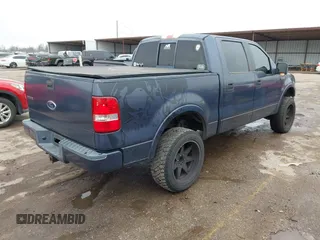 2004 Ford F-150 XLT with VIN 1FTPW14514KD30054, listed as a IAAI auction lot 41440735 with 202,340 mi miles. Bid and sale history available at carsss.com. Image 4.