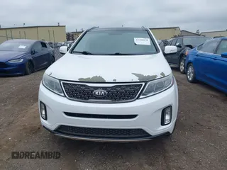 2014 Kia Sorento SX z VIN 5XYKWDA71EG520204, wystawiony jako IAAI lot #42388830 z przebiegiem 193 262 mil mil oraz . Historia ofert i sprzedaży dostępna na DreamBid. Obrazek 12.