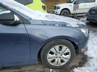 2014 Chevrolet Cruze LS with VIN 1G1PB5SG7E7142059, listed as a IAAI auction lot 41435050 with 106,067 mi miles. Bid and sale history available at carsss.com. Image 14.
