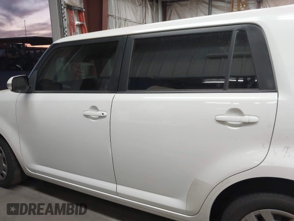 2014 Scion xB with VIN JTLZE4FE1EJ060281, listed as a IAAI auction lot 41477386 with 61,423 mi miles. Bid and sale history available at carsss.com. Image 14.