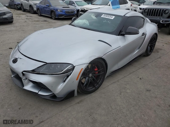 2021 Toyota GR Supra 3.0 with VIN WZ1DB0C0XMW039660, listed as a Copart auction lot 86909354 with 30,272 mi miles and Salvage Title. Bid and sale history available at carsss.com. Image 1.