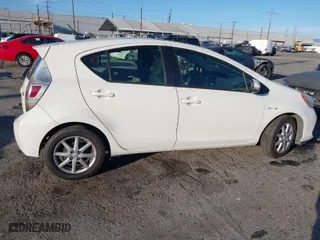 2014 Toyota Prius c One with VIN JTDKDTB31E1064698, listed as a IAAI auction lot 41652199 with 388,906 mi miles. Bid and sale history available at carsss.com. Image 13.
