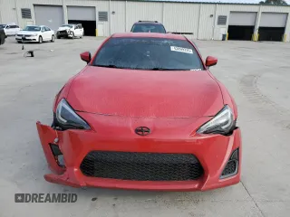 2016 Scion FR-S with VIN JF1ZNAA18G8704454, listed as a Copart auction lot 43899335 with 69,744 mi miles and Salvage Title. Bid and sale history available at carsss.com. Image 5.