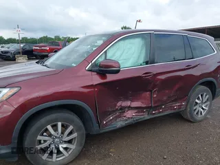 2021 Honda Pilot EX-L with VIN 5FNYF6H53MB094015, listed as a IAAI auction lot 42545722 with 66,065 mi miles and . Bid and sale history available at DreamBid. Image 6.