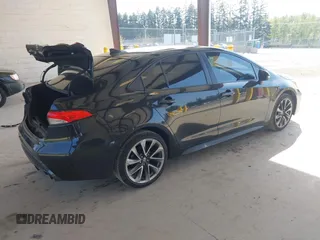 2022 Toyota Corolla SE with VIN JTDS4MCE3NJ094596, listed as a IAAI auction lot 42117369 with 92,045 mi miles and . Bid and sale history available at DreamBid. Image 4.