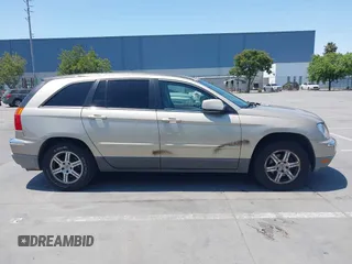 2007 Chrysler Pacifica Touring z VIN 2A8GM68X27R214813, wystawiony jako IAAI lot #42442586 z przebiegiem 117 559 mil mil oraz . Historia ofert i sprzedaży dostępna na DreamBid. Obrazek 13.