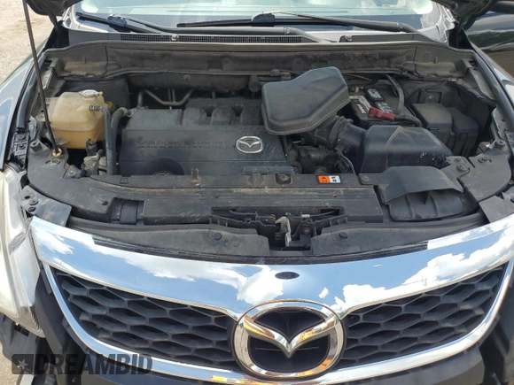 2012 Mazda CX-9 Grand Touring z VIN JM3TB2DAXC0358272, wystawiony jako Copart lot #60703665 z przebiegiem 278 558 mil mil oraz Szkoda całkowita • Salvage title. Historia ofert i sprzedaży dostępna na DreamBid. Obrazek 12.