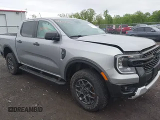 2024 Ford Ranger XLT with VIN 1FTER4HH7RLE24669, listed as a IAAI auction lot 42263062 with 7,832 mi miles and . Bid and sale history available at DreamBid. Image 1.