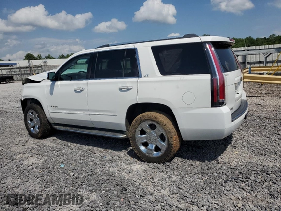 2015 Chevrolet Tahoe LTZ с VIN 1GNSCCKC0FR708625, выставлен на аукционе Copart как лот 57563325 с пробегом 139 616 миль миль и Списание • Salvage title. История ставок и продаж доступна на DreamBid. Изображение 2.