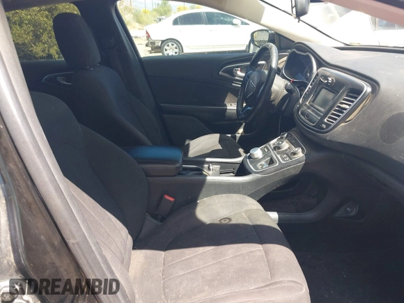 2015 Chrysler 200 Limited with VIN 1C3CCCAB2FN701564, listed as a IAAI auction lot 42068302 with 226,503 mi miles. Bid and sale history available at carsss.com. Image 5.