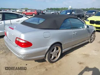 2003 Mercedes-Benz CLK 430 z VIN WDBLK70G13T130450, wystawiony jako IAAI lot #42280960 z przebiegiem 83 013 mil mil oraz . Historia ofert i sprzedaży dostępna na DreamBid. Obrazek 4.