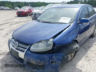 2009 Volkswagen Jetta SE z VIN 3VWRZ71K99M159242, wystawiony jako IAAI lot #42200917 z przebiegiem 226 285 mil mil oraz . Historia ofert i sprzedaży dostępna na DreamBid. Obrazek 6.